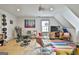 Cozy bonus room offering ample space for both relaxation and exercise equipment at 215 Calgary Dr., Peachtree City, GA 30269