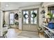 Welcoming foyer with decorative mirrors, stylish decor, and neutral tones at 215 Calgary Dr., Peachtree City, GA 30269