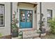 Close-up of elegant double front doors, adorned with wreaths, leading to a welcoming home at 215 Calgary Dr., Peachtree City, GA 30269