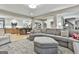 Inviting living room flows seamlessly into the kitchen, creating an open and connected living space at 215 Calgary Dr., Peachtree City, GA 30269