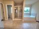 Bathroom featuring tiled shower, garden tub, and tile flooring at 542 Hinton Farm Way, Dacula, GA 30019
