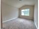 Bedroom with neutral walls and carpet flooring at 542 Hinton Farm Way, Dacula, GA 30019