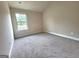 Bedroom with neutral walls and carpet flooring at 542 Hinton Farm Way, Dacula, GA 30019