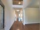 Spacious foyer with gleaming hardwood floors, high ceilings, and an open view of the living spaces at 542 Hinton Farm Way, Dacula, GA 30019