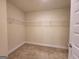 Walk-in closet with carpeted floor and wire shelving at 542 Hinton Farm Way, Dacula, GA 30019