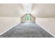 Spacious finished attic with neutral walls, patterned carpet, and recessed lighting at 146 Calico Loop, Grantville, GA 30220