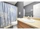 Bathroom featuring a vanity and a shower with a blue turtle themed curtain at 146 Calico Loop, Grantville, GA 30220