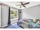 Bright bedroom with a ceiling fan and a large window that provides natural light at 146 Calico Loop, Grantville, GA 30220