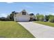 Well maintained one story home with a long driveway and well manicured lawn at 146 Calico Loop, Grantville, GA 30220