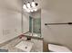 Bathroom with granite countertop and modern fixtures at 147 Tara Blvd, Loganville, GA 30052