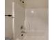 Bathroom featuring a tub shower with a white shower surround at 147 Tara Blvd, Loganville, GA 30052