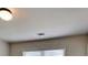 A standard bedroom features neutral walls, carpet, and a ceiling fan with an overhead light at 147 Tara Blvd, Loganville, GA 30052