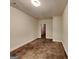 A simple bedroom with neutral walls and basic lighting, presenting a blank canvas for personalization at 147 Tara Blvd, Loganville, GA 30052
