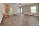 Spacious bonus room with a ceiling fan and a door leading to the outside at 147 Tara Blvd, Loganville, GA 30052