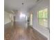 Spacious living room with hardwood floors, ample natural light, and a bright, welcoming atmosphere at 147 Tara Blvd, Loganville, GA 30052