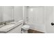 Bathroom with a granite vanity and tub/shower combination at 3209 Broadnax Mill Rd # 6, Loganville, GA 30052