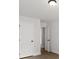 Bedroom featuring neutral paint, wood floors, and white doors at 3209 Broadnax Mill Rd # 6, Loganville, GA 30052