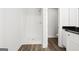 Clean, bright bathroom featuring a walk-in shower and a vanity with a black countertop at 3219 Broadnax Mill Rd # 5, Loganville, GA 30052
