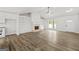 Bright living room with a fireplace, built-in shelving and new flooring at 3219 Broadnax Mill Rd # 5, Loganville, GA 30052