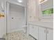 Well-lit bathroom featuring a shower, toilet, and vanity with storage at 5493 Alexanders Lake Sw Rd, Stockbridge, GA 30281