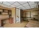 Office space with wood paneling and built-in shelving at 5493 Alexanders Lake Sw Rd, Stockbridge, GA 30281
