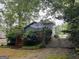Backyard view of a home featuring a wood deck, stairs and fenced yard, perfect for pets at 332 Wyngate Rd, Auburn, GA 30011