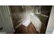 Bright bathroom with a glass shower and an extended vanity with plenty of storage at 332 Wyngate Rd, Auburn, GA 30011
