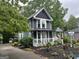 Charming two-story home featuring a welcoming porch and beautifully landscaped front yard at 332 Wyngate Rd, Auburn, GA 30011