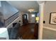 Inviting foyer with hardwood floors and elegant staircase leading to the upper level at 332 Wyngate Rd, Auburn, GA 30011