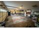 Spacious garage with storage shelving and plenty of room for parking and projects at 332 Wyngate Rd, Auburn, GA 30011