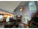 Spacious living room with hardwood floors, stone fireplace, and soaring vaulted ceilings at 332 Wyngate Rd, Auburn, GA 30011
