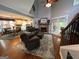 Spacious living room with hardwood floors, stone fireplace, and soaring vaulted ceilings at 332 Wyngate Rd, Auburn, GA 30011