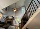 Bright living room features vaulted ceilings, a fireplace, and hardwood floors at 332 Wyngate Rd, Auburn, GA 30011