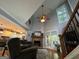 Bright living room features vaulted ceilings, a fireplace, and hardwood floors at 332 Wyngate Rd, Auburn, GA 30011