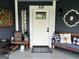 Cozy front porch with decorative accents, a welcome sign, and comfortable seating at 332 Wyngate Rd, Auburn, GA 30011