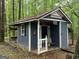 Exterior of workshop with covered porch and decorative detailing at 332 Wyngate Rd, Auburn, GA 30011