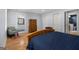Bedroom featuring hardwood floors, natural light, with an en-suite bathroom at 1858 Ridgeland Dr, Decatur, GA 30032