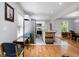 Modern kitchen with stainless steel appliances and an adjacent dining area at 1858 Ridgeland Dr, Decatur, GA 30032