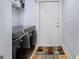 Convenient laundry area with modern washer and dryer units, and ample storage space at 1858 Ridgeland Dr, Decatur, GA 30032