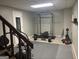 Finished basement with exercise equipment and durable rubber flooring for workouts at 160 Hialeah Way, Roswell, GA 30075