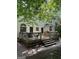 Large wooden deck provides ample outdoor seating and entertaining space with a grill at 160 Hialeah Way, Roswell, GA 30075