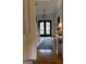 Inviting foyer with hardwood floors and a view of the front door at 160 Hialeah Way, Roswell, GA 30075