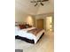 Spacious bedroom featuring plush carpet, tray ceiling, and a king-sized bed at 160 Hialeah Way, Roswell, GA 30075