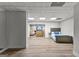 The finished basement is versatile, with stylish flooring, multiple spaces, and neutral colors at 105 Riviera Ct, Fayetteville, GA 30215