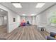 Finished basement space featuring durable flooring, playroom with toys, and natural light at 105 Riviera Ct, Fayetteville, GA 30215