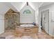 Modern bathroom featuring a glass enclosed shower, jacuzzi tub, and mosaic tile at 105 Riviera Ct, Fayetteville, GA 30215