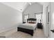 Cozy bedroom with neutral walls and a large window for natural light at 105 Riviera Ct, Fayetteville, GA 30215