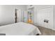 Cozy bedroom with neutral walls leading to closet and bedroom at 105 Riviera Ct, Fayetteville, GA 30215