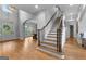 Spacious foyer with hardwood floors and staircase leading to the second floor at 105 Riviera Ct, Fayetteville, GA 30215