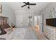 Primary bedroom with a view to the ensuite and a glimpse of another room at 105 Riviera Ct, Fayetteville, GA 30215